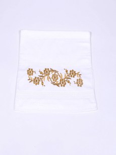 serviette à fleur doré